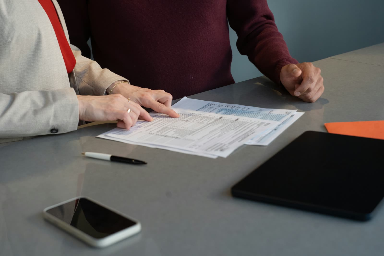 Documents being reviewed at a desk